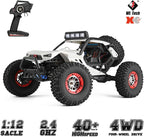 WLtoys 12429 4WD RC truck driving on rocky terrain
